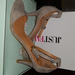 Taupe single strap heels.